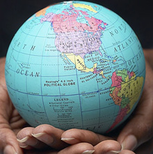 Globe of the world in one's hands Globe of the world in one's hands