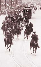 The Mounted Police charging down Main Street The Mounted Police charging down Main Street