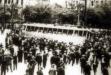crowd attempts to tip over a tram crowd attempts to tip over a tram