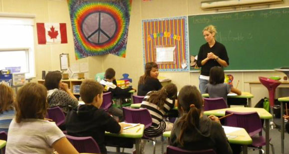 Students and teacher in the classroom Students and teacher in the classroom